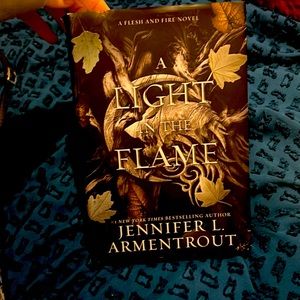 Hardcover- “A light in the flame”. Author Jennifer L. Armentrout
